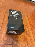 Exterior of Cards Against Humanity CA edition box showing branding