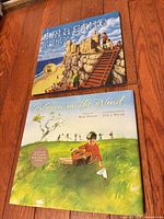 Cover view of both hardcover picture books