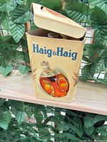 Decanter in open box showing front graphics