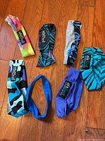 All seven headbands laid out showing patterns and colours