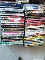 Both stacks of DVDs showing overall quantity