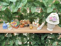 Shelf showing all seven decorative items