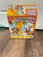 Front of Mattel Tumblin' Monkeys box showing graphics and branding