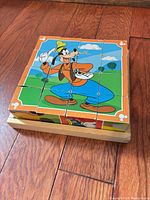 Puzzle assembled on tray showing Goofy scene