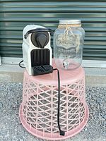 Coffee maker and glass dispenser side by side