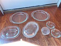 All seven Pyrex glass pieces laid out