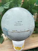 Front view showing manufacturer text and surface wear