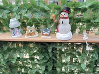 Group shot of all four holiday decor items on shelf