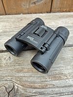 Front angled view of binoculars folded