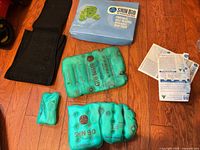 All contents: three Shin Bio heat packs, black fabric wrap, retail box, instruction sheets