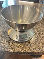 Scale with bowl assembled on countertop