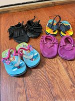 Group shot showing all four pairs on floor