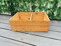 Overall view of pine crate with divider