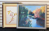 Both framed artworks side by side for scale and comparison