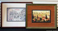 Both framed artworks side by side