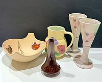Group view of all five pottery pieces