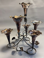 full view of assembled epergne with all seven trumpets attached