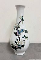 Full view of vase front profile showing overall form and painted motif