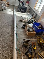 Full length view of aluminum telescoping pole with straps