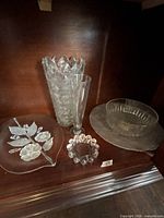 All six glass pieces on shelf