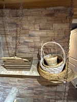 Overall view showing hanging wood crate and nested wicker items