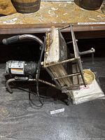 Filter press attached to Flojet pump, view of entire assembly