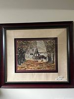 Front view of framed horse landscape print in mahogany-finish frame