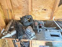 Overview of sanders and air tools on workbench
