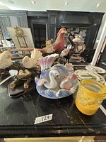 Group shot showing all four figurines on countertop