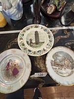 All three porcelain plates on countertop