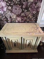 Closed nightstand showing top surface and front doors