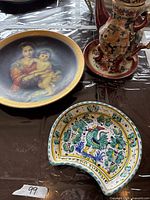 Large Madonna & Child Limoges plate, majolica rooster dish and Satsuma teapot on saucer
