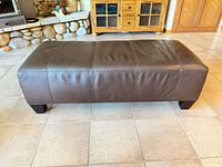 Full top and side view of leather bench