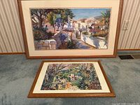 Both framed prints side by side for scale and style