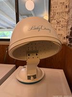 Overall view of Lady Dazey tabletop hair dryer showing dome hood and support arm