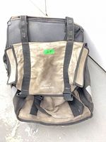 Front view showing overall pannier, straps, color, and condition