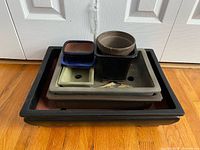 Stacked view of all planters showing size range and colours