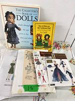 Group shot showing both books and assorted pattern envelopes