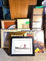 Group shot of all framed items and record cover