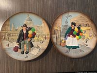 Front view of both Royal Doulton plates