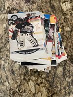 Stack showing top card Daniel Berthiaume and visible assortment beneath