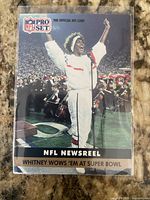 Front of 1991 Pro Set Whitney Houston NFL Newsreel trading card in sleeve