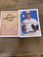 Fronts of two cards from the set: ’91 checklist and Steve Karsay