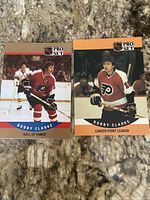 Front view of both Bobby Clarke Pro Set hockey cards