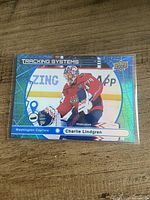 Front of Charlie Lindgren Tracking Systems Upper Deck card in sleeve