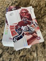 Stack of Upper Deck SP Excitement hockey cards, top card José Théodore