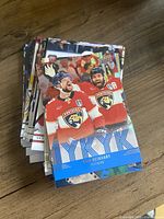 Front view of stack of Upper Deck 2025-26 Series Two hockey cards, top card Sam Reinhart, Florida Panthers