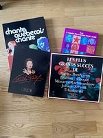 Overview of the four French 8-track tape box sets laid out on floor