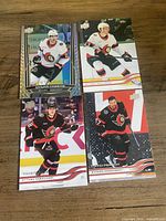 Four Ottawa Senators Upper Deck Series One hockey cards laid out on a table