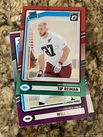 Front view of Tip Reiman Press Proof Rated Rookie card with Will Shipley card partially visible underneath